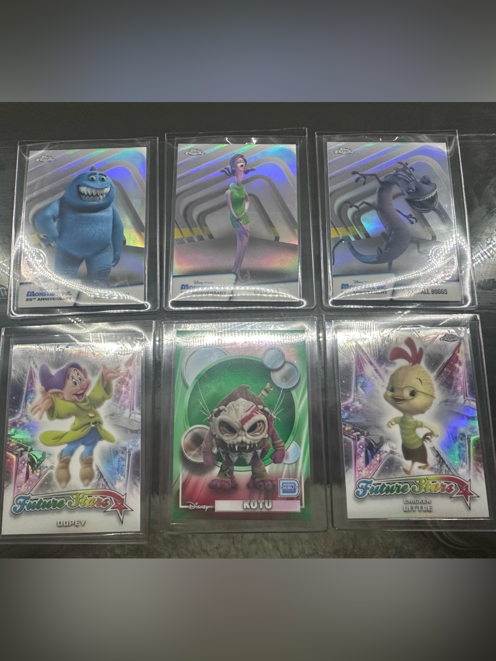 Assortment of Topps Disney Chrome 2026 cards, Kotu 94/99
